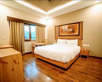 Hotel Jsr Inn - Dehradun - Bedroom