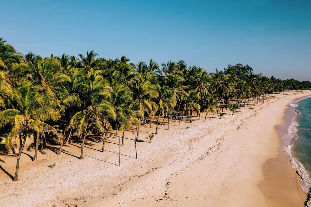 The Coconut Beach Boutique Lodge & Spa - Tiwi - Strand
