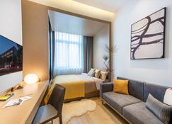 base-Sanlitun Serviced Apartment - Pechino - Camera da letto