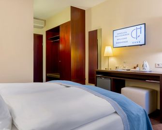 Central Hotel Freiburg - Freiburg im Breisgau - Makuuhuone