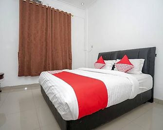 OYO 346 Guest House Dempo Jakabaring - Palembang - Habitación