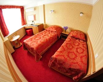 Tourist Hotel - Kiew - Schlafzimmer