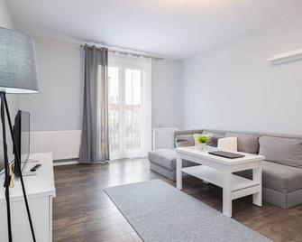 Apartments Dworcowa by Noclegi Renters - Kolobrzeg - Stue