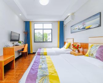 Huiyuyuan Boutique Inn (Huangshan North Railway Station Branch) - Huangshan - Slaapkamer