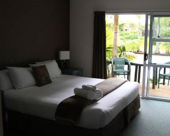 وودلاندز موتل آند كونفرنس فينيو - كيريكيري - غرفة نوم