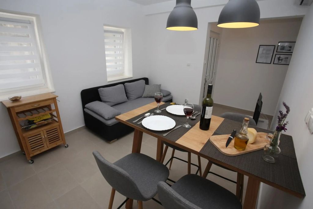 Apartmani Tri bunje - Tribunj - Dining room