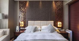 Soluxe Hotel Urumqi - Ürümqi - Bedroom