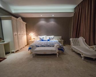Yikezhan Boutique Hotel - Fuxin - Bedroom