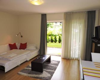 Alpe-Adria Apartments - Finkenstein am Faaker See - Wohnzimmer