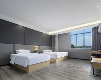 Borrman Hotel Xiangyang Gucheng National Wetland Park - Xiangyang - Camera da letto