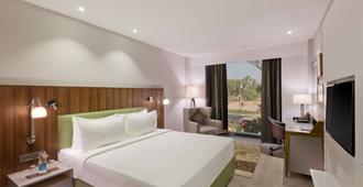 Country Inn & Suites by Radisson Zirakpur - Zerakpur - Bedroom