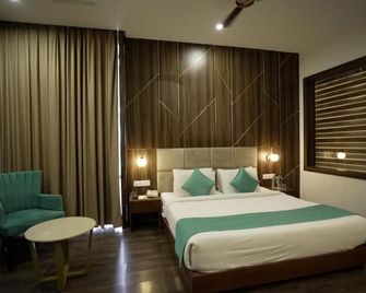 Hotel Krinoscco - Faizābād - Habitación