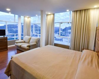 Hotel Petropolis Inn - เปโตรโปลิส - ห้องนอน