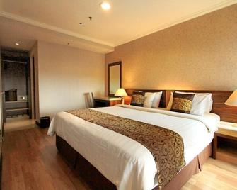 Galeri Ciumbuleuit Family & Business Hotel - Bandung - Bedroom