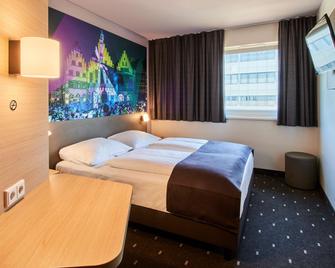 B&B Hotel Frankfurt-Niederrad - فرانكفورت ام ماين - غرفة نوم