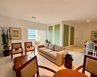 Apartamentos e Suítes na Praia - Fortaleza - Sala de estar