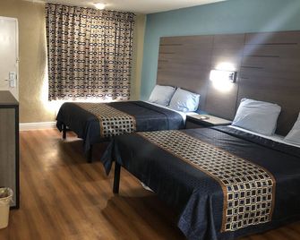 Luxury Inn & Suites - Houston - Bedroom