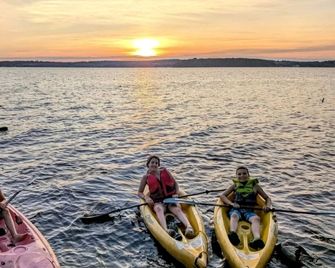 Lakeside Group Cabin with Huge Deck, Fire Pits & Sunset Views in Ontario, Canada - Roseneath