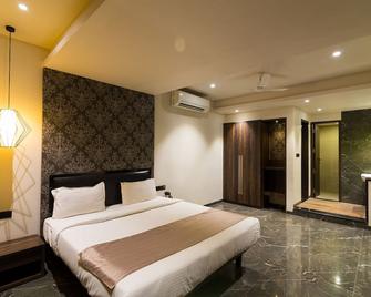 Sentosa Resorts and Water Park - Pune - Bedroom