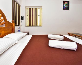 Hare Krishna Inn - Guruvayoor - Habitación