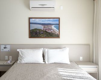 Residencial Onda Azul - Bombinhas - Спальня