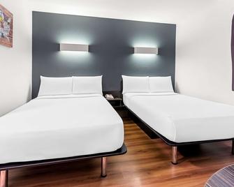 Econo Lodge - איידהו פולס - חדר שינה