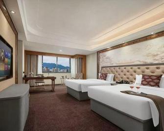 Huangchen Hotel - Chenzhou - Schlafzimmer