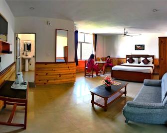 Highland Village Resort - דרמאסאלה - חדר שינה