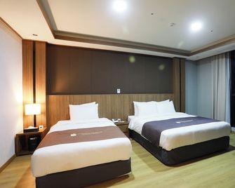 Benikea Hotel Seosan - Seosan - Bedroom