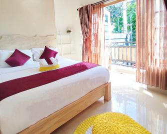Remen Room Bed & Breakfast - Depok - Habitación