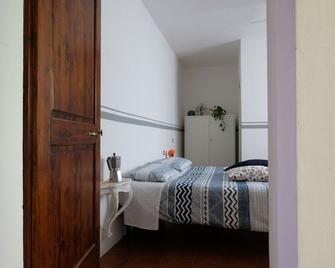 Casa Monteluro - B&b - Tavullia - Спальня