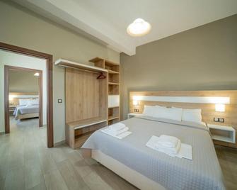 Hotel Olympion - Potos - Schlafzimmer