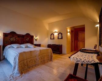 Antica Dimora La Corona - San Pantaleo - Habitación