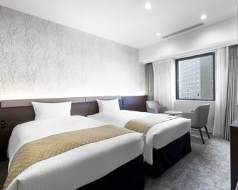 Daiwa Roynet Hotel Sapporo Nakajima Koen - Sapporo - Sypialnia