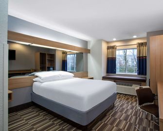Microtel Inn & Suites by Wyndham Matthews/Charlotte - Matthews - Schlafzimmer