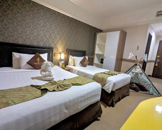 أماريلو هوتل - سوراكارتا - غرفة نوم