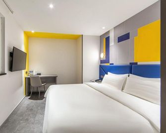7Days Inn Chongqing Shapingba - تشونغتشينغ - غرفة نوم