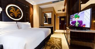 Myko Hotel & Convention Center Makassar - Makassar - Yatak Odası