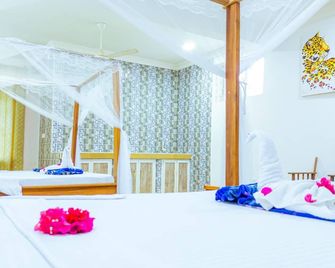 Sands Inn Hotel - Pwani Mchangani - Habitación