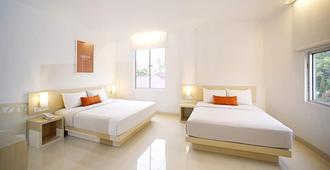 Zuri Express Hotel Pekanbaru - Pekanbaru - Soveværelse