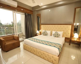 Starex-Inn - Gurugram - Bedroom
