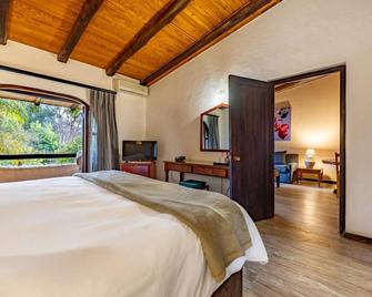 Malaga Hotel - Emgwenya - Schlafzimmer