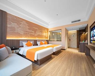 Beidaihe Yuehua Hotel(Tiger Stone Bath Shop) - Qinhuangdao - Slaapkamer