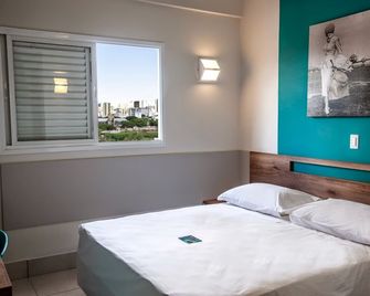 Mega Moda Hotel - גואיאניה - חדר שינה