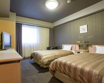 Hotel Route-Inn Tokyo Ikebukuro - Tokio - Slaapkamer
