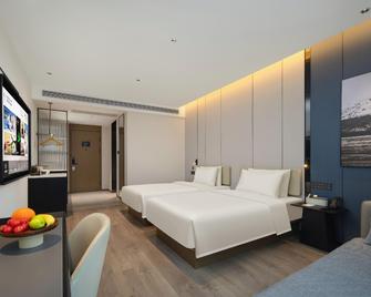 Atour Hotel Wuxi East Station Yingyuehu Park Metro Station - Wuxi - Habitación