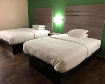 Travelers Inn And Suites Wharton - Wharton - Ložnice