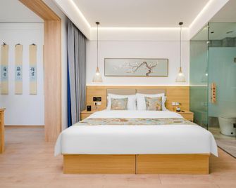 Yashe Boutique Hotel (Anyang Wanda Plaza Branch) - Anyang - Camera da letto
