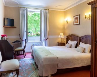 Hôtel Le Plantagenet - שינו - חדר שינה