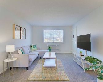 Garage | Contemporary + Spacious | Two Bedroom - North Canton - Living room